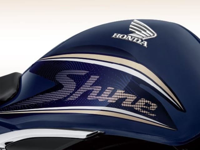 Honda Activa and Shine motorcycles showroom display